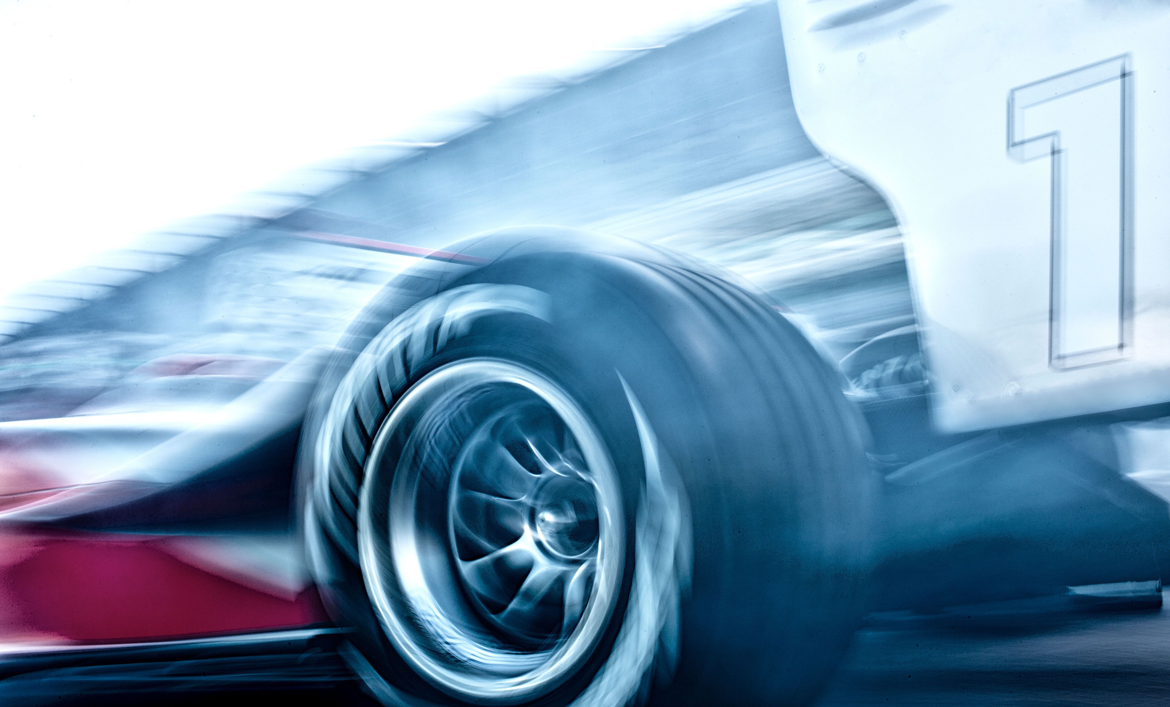 MoneyGram Haas VF-26 2026 Formula 1 car, white and red MoneyGram livery with black accents, low angle dramatic studio lighting